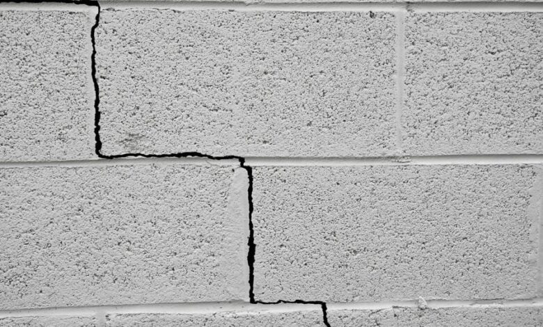 signs of foundation problems in house including wall cracks and uneven floors