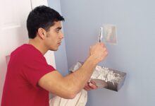 how to patch a hole in wall — damaged drywall before repair