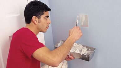 how to patch a hole in wall — damaged drywall before repair