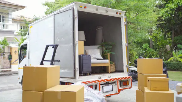 long distance moving companies loading household belongings into a moving truck
